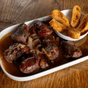 Traditional Portuguese dish served during Fado night with authentic dinner experience