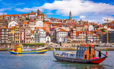 Porto, Portugal old town skyline from across the Douro River porto de lisboa